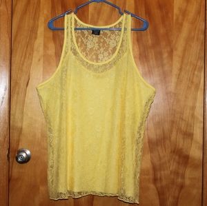 Yellow lace top with a spaghetti strapped camisole